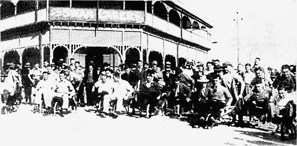 Wheelbarrow race outside Newmarket Hotel